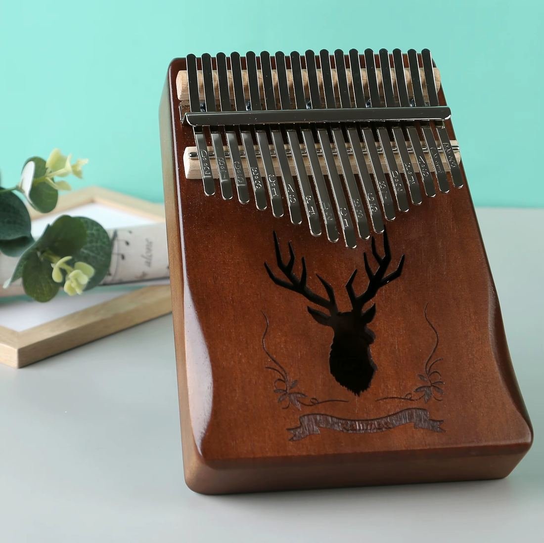 Happy Kalimba, mahogany brown, with engraved deer motif